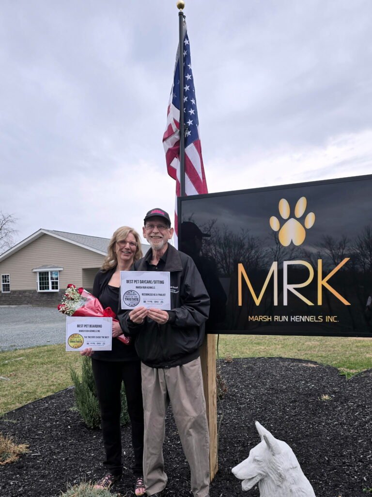 Bart & Betsy Stevens in front of Marsh Run Kennels!